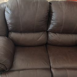 Leather Loveseat Recliner - Ashley manual pulls