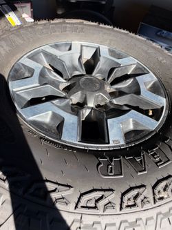 All 4 wheels and tires used Toyota Tacoma wheels and tires 265/70/16 tires