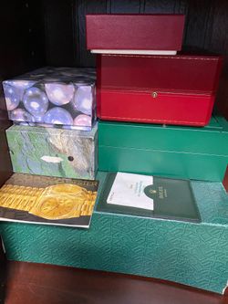 Rolex Cartier watch boxes and cases