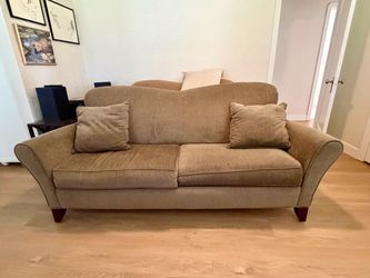 Tan Fabric Two-Cushion Sofa with Throw Pillows
