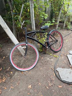 Black Cruiser Bike with Red Rims