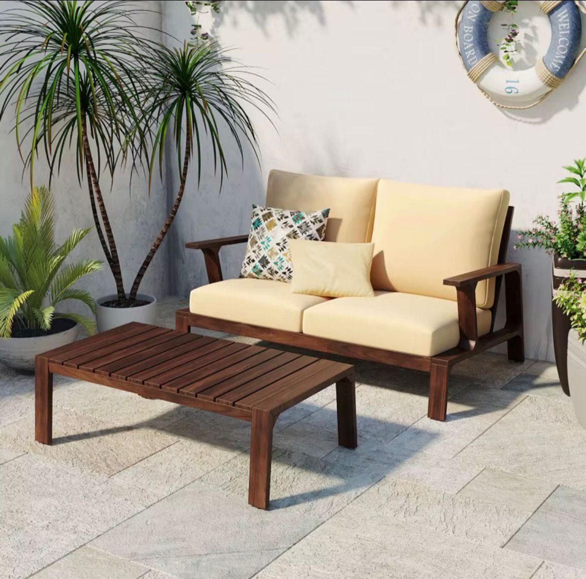 Outdoor Sofa with Cushions and a Coffee Table