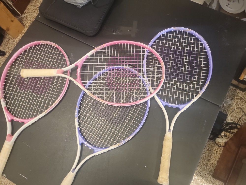 Four Tennis Rackets