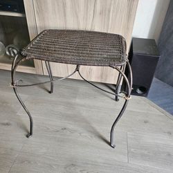 Wicker and metal table