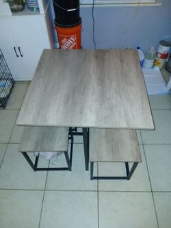 Compact table with stools