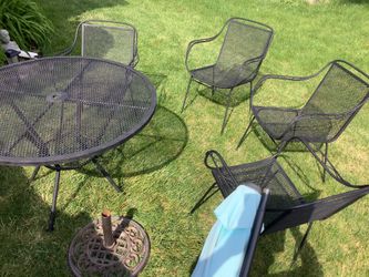 Metal Woodland Metal  set of 4 chairs and table from 1969. It was originally white and we painted black, no brakes in frame, very heavy!   This is the