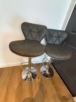 Set a two modern dark gray adjustable barstools