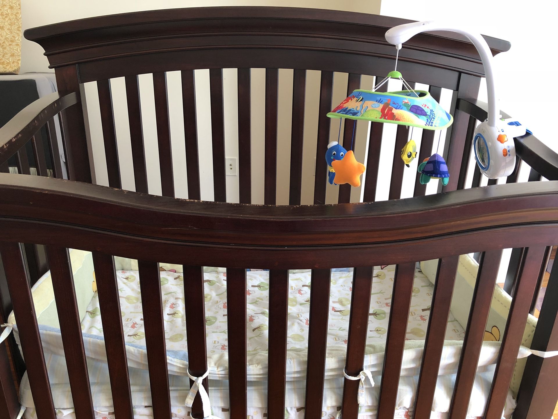 Infant crib with mobile