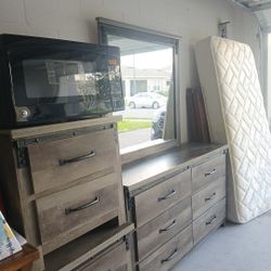 Gray dresser,black Microwave 