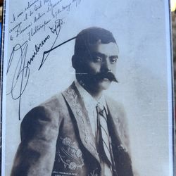 For sale wall plaque of Emiliano Zapata writing a personal message to a friend