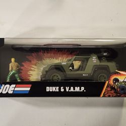 JADA 1:32 SCALE METAL DIECAST.  GI.JOE. DUKE  .V.A.M.P WITH DUKE METAL DIECAST FIGURE. 