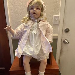 Porcelain Doll Pink Eyes