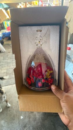 Glass Angle With Flowers Inside