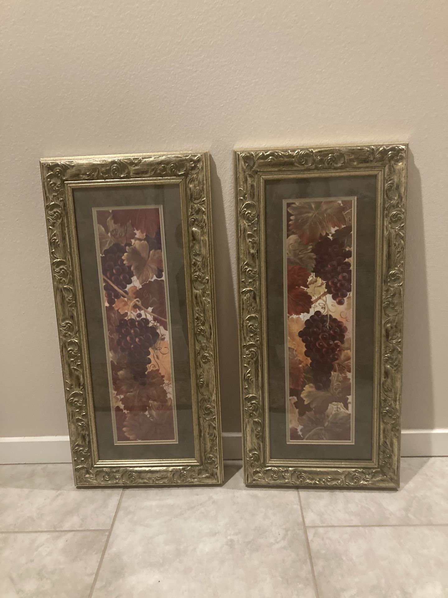 A pair of framed Glynda Turley “Abundance” Grapes, and Leaves Prints signed 1993. 16”x36”.