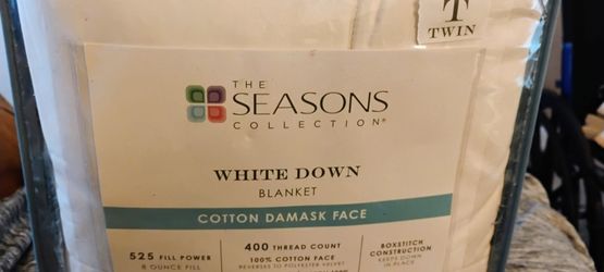 Unused still in package Goose Down comforter in damask cotton  size Twin