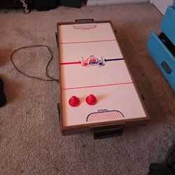 vintage plug in air hockey table