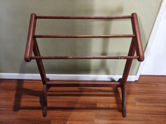 Vintage wooden clothes hanging rack