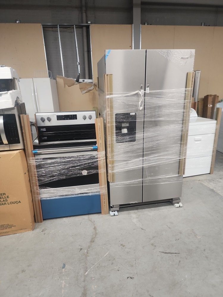New Whirlpool Stainless Steel Fridge And Electric Stove