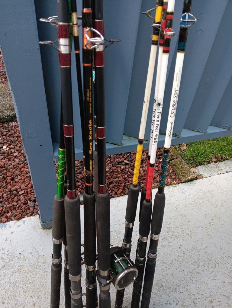 10 Fishing Poles One Reel $120 TAKES ALL