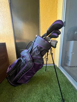 Woman golf clubs
