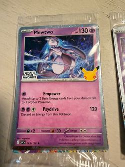 Pokémon 30th Anniversary Mewtwo Holo – 063/128 with the special Pikachu 30th Anniversary stamp.