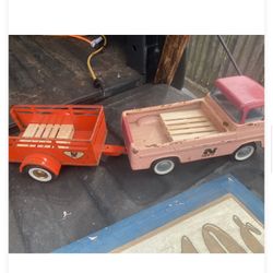Old school  Toy Ford truck with a trailer