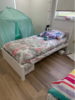2 white twin bed frames