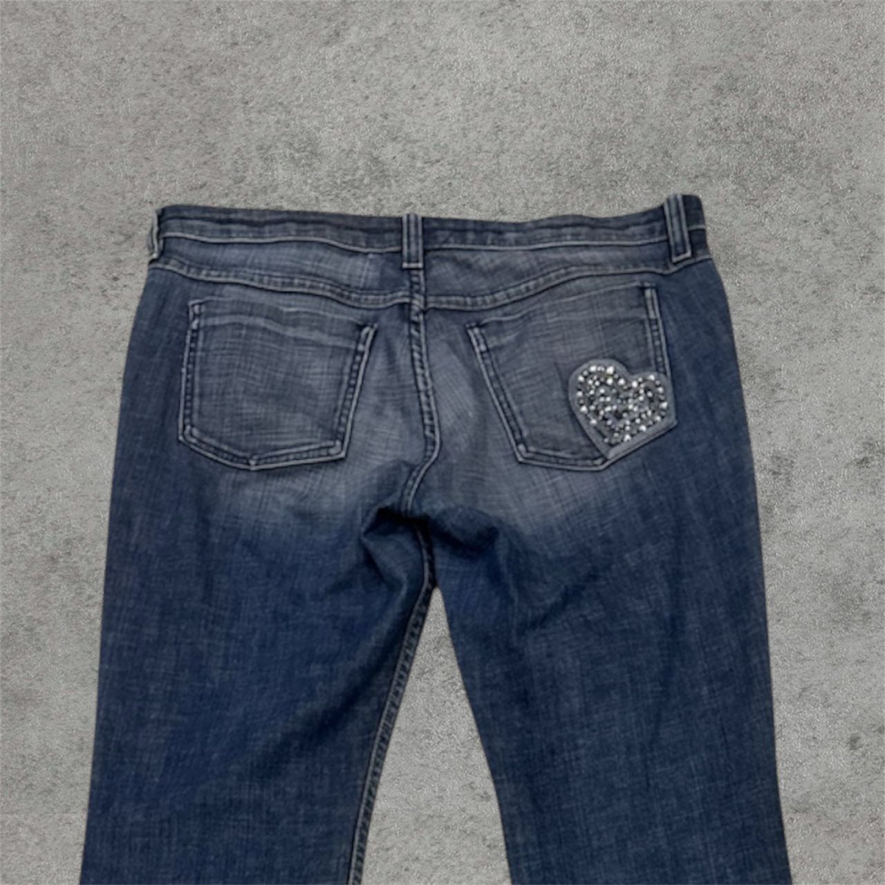 Vintage Juicy Couture blue low-rise flare jeans with heart patch embroidery
