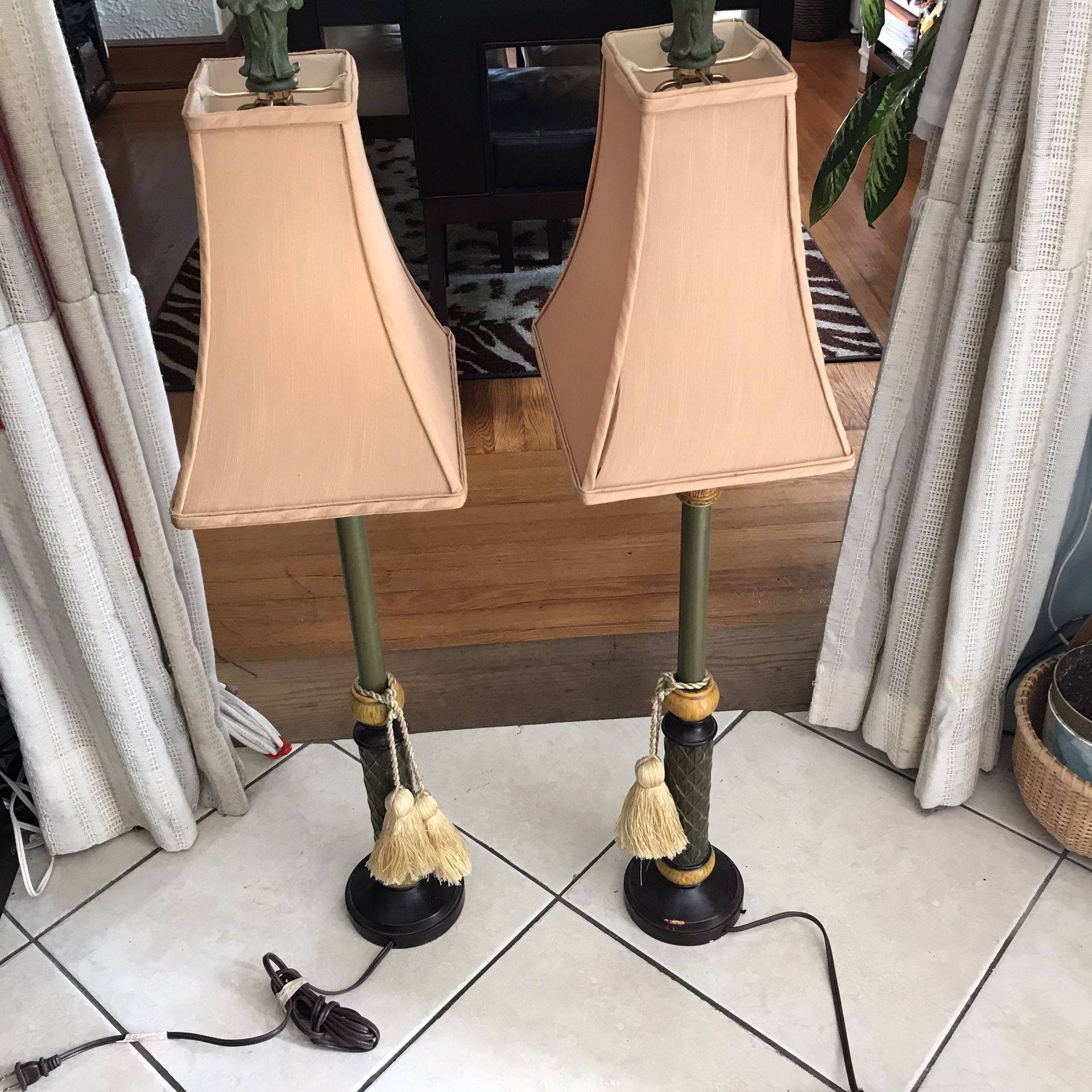 A pair of vintage tall lamps.