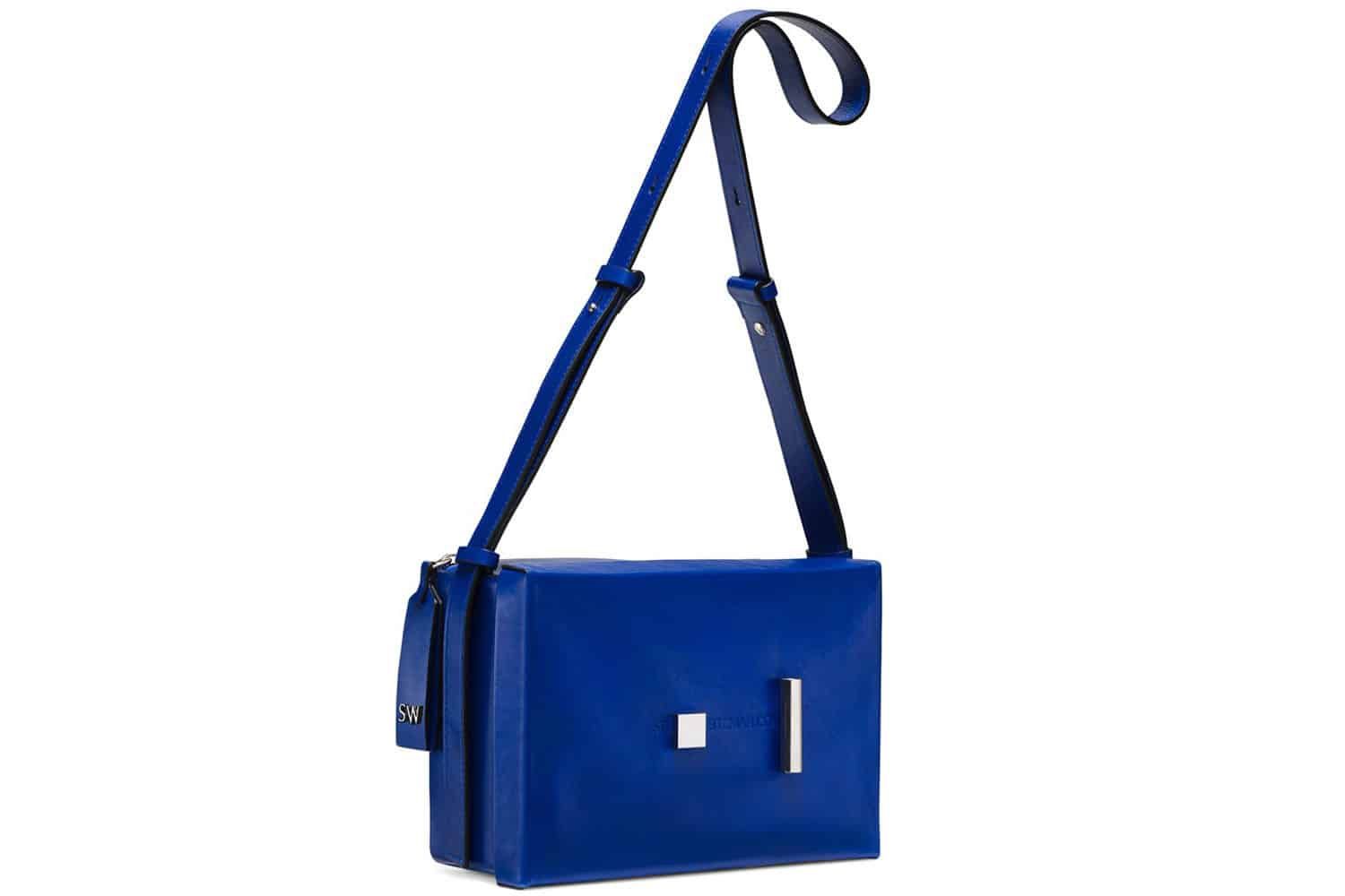 Chic turquoise snake print design. Perfect for adding flair to any outfit. Ideal for fashion-forward women.