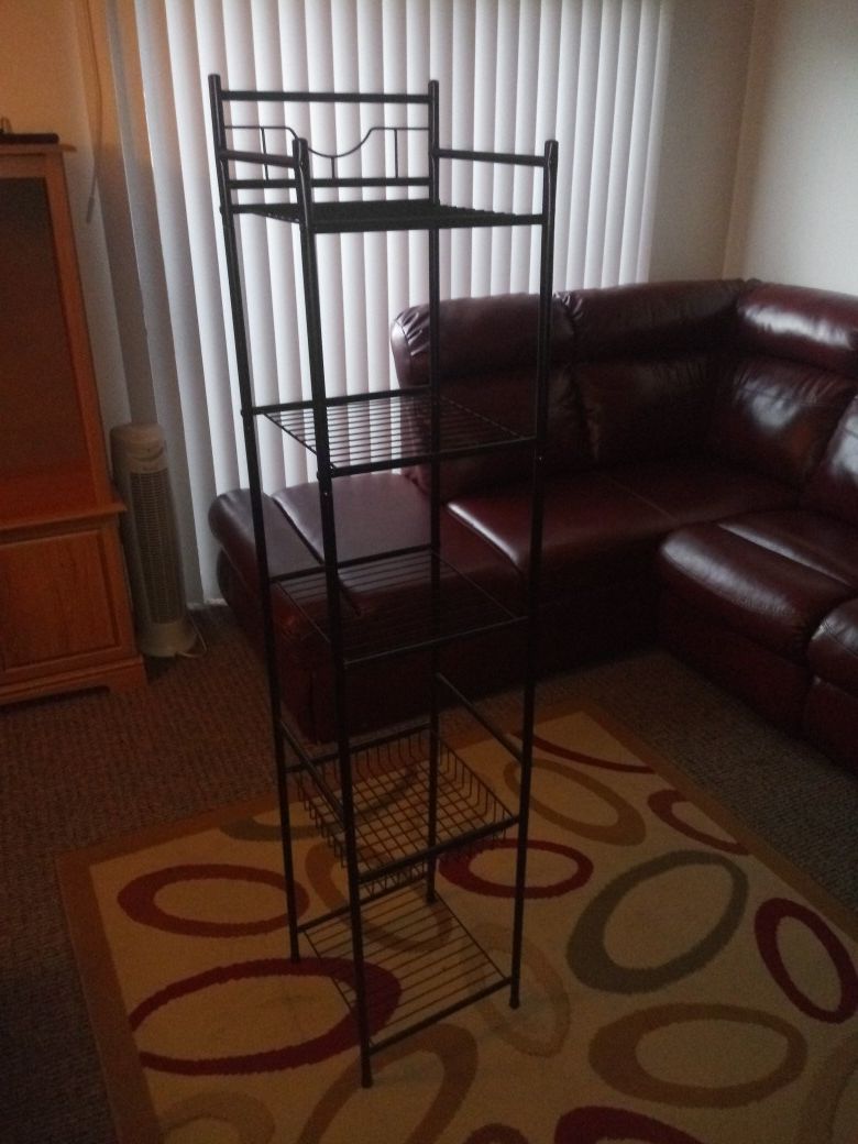 Black metal shelf unit