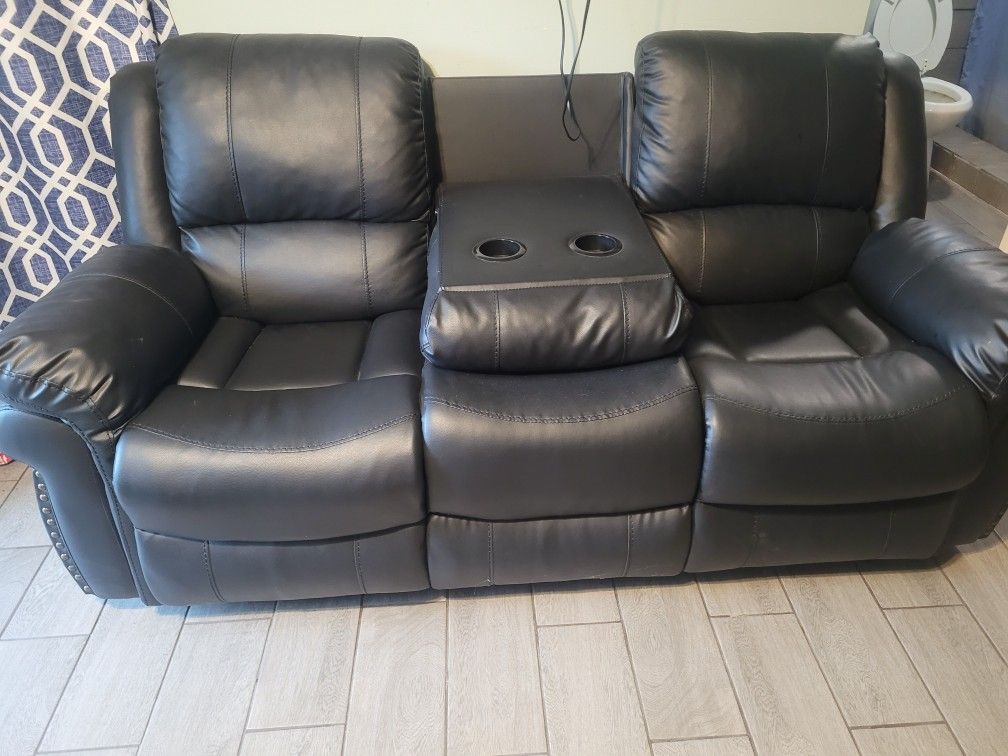 2 Recliner Black Couches