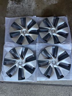 Tesla wheel covers. 19-inch, 2020 model year. Genuine. Used, in good condition.