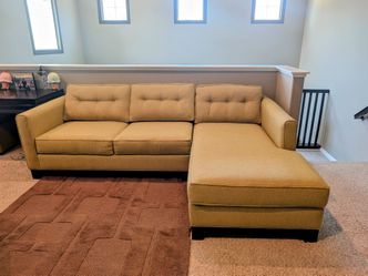Green couch with right chaise