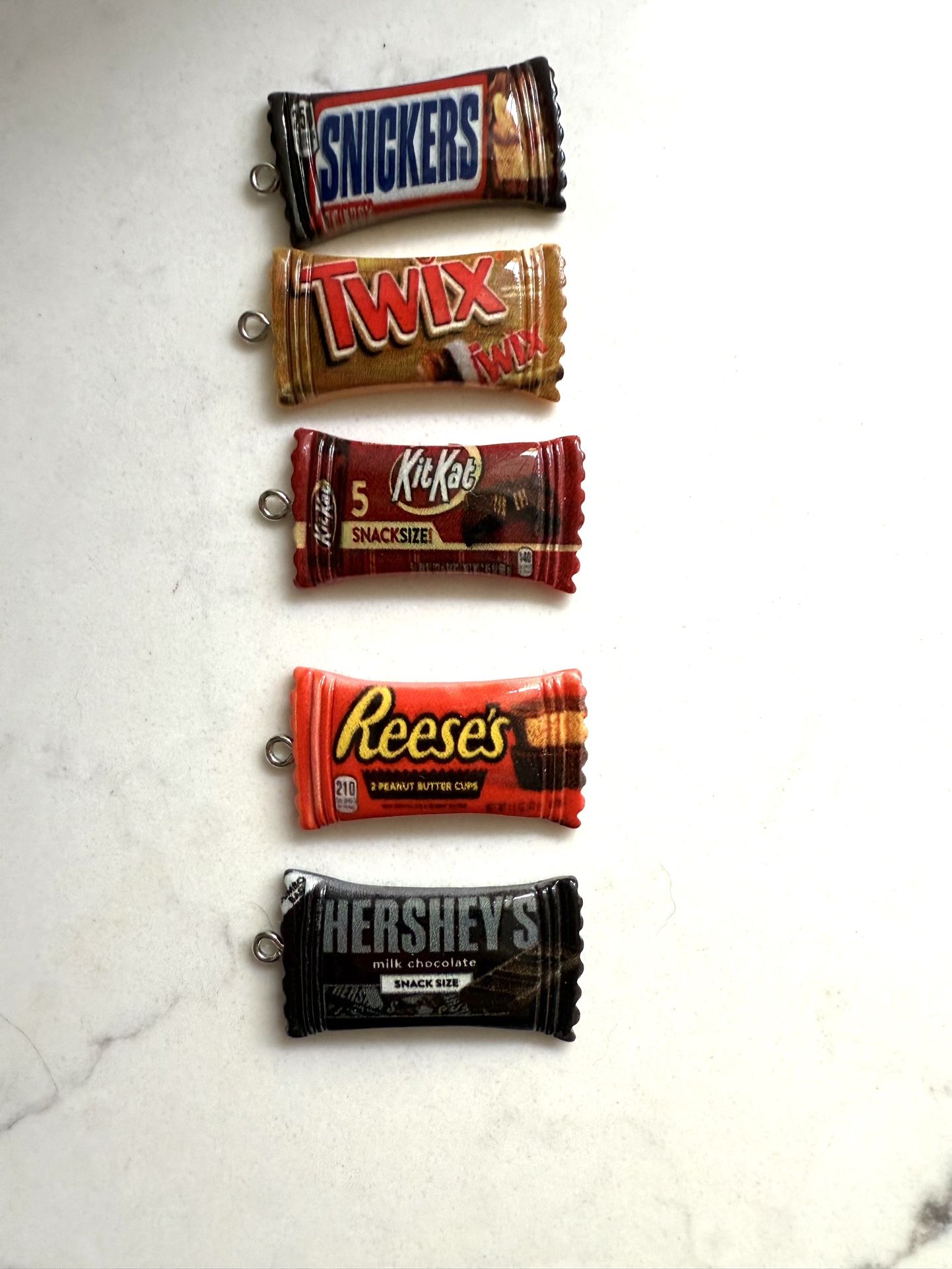 So Cute! Resin Candy Bar Charms: Twix, Reese’s, Hershey, Kit Kat & Snickers - Set of 5 Would be cute on a trinket shelf, in a trinket dish or for j