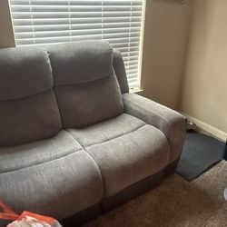 Like new reclining couch and love seat