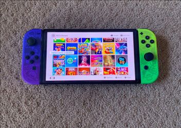 NINTENDO SWITCH OLED MODEL with 125 POPULAR SWITCH GAMES
