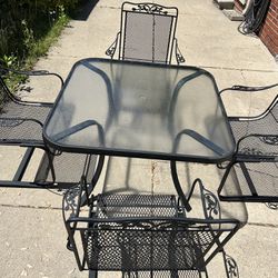 Set Of 4 Wrought Iron Chairs  And Table 