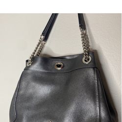 Coach  Leather Turnover 