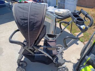 Double stroller with standing board