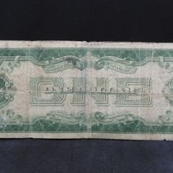 1928-A $1 Silver Certificate-the famous "Funny-Back." Fine.