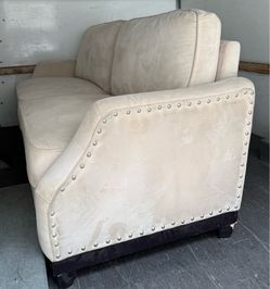 Beige sofa and love seat