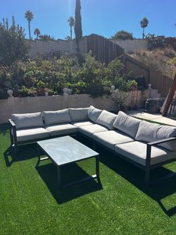 Living Spaces Ravelo 4-Piece Outdoor Sectional + Coffee Table – Aluminum Patio Set