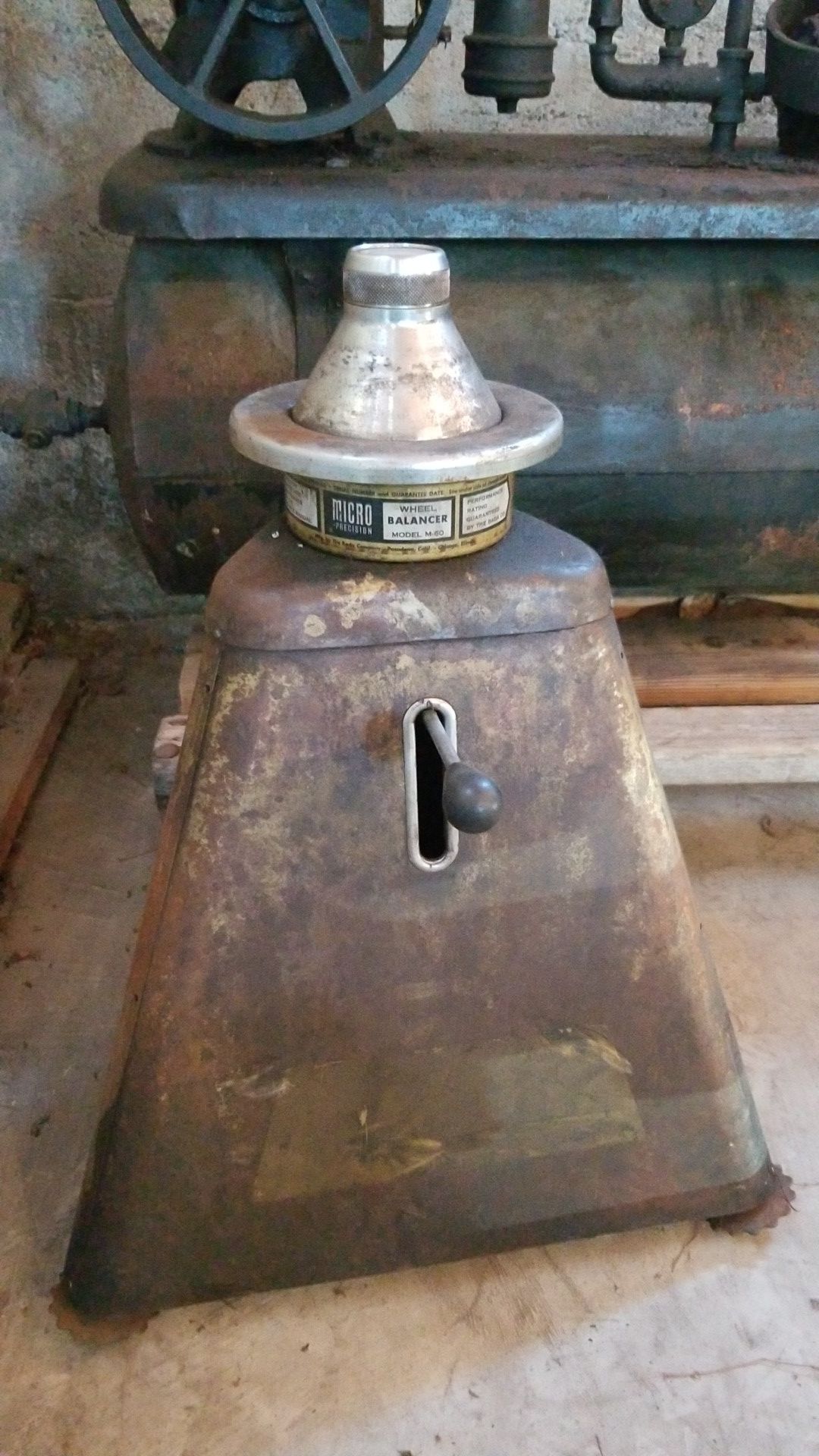 Vintage gas station wheel balancer