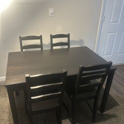IKEA HÄGERNÄS Table and 4 chairs, black stained pine