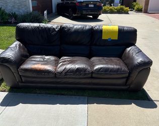 Free leather couch. 94” wide