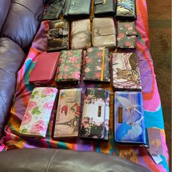 Wallets and clutches. See all pictures. One dollar to five dollars on new ones.
