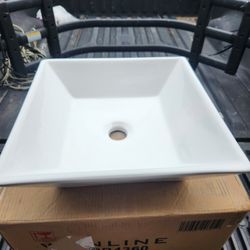 White Pair Of Bathroom Sinks. 