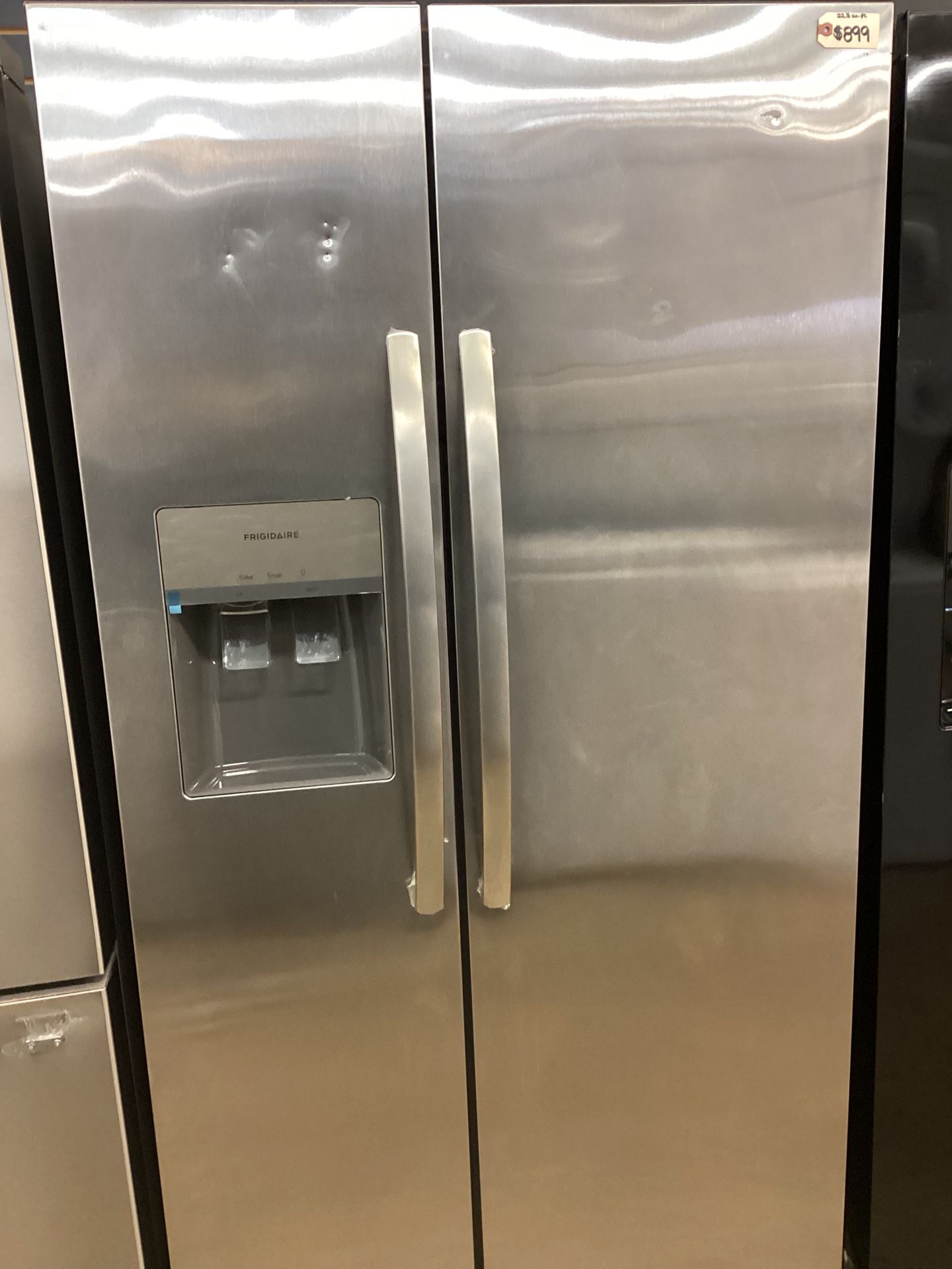 Frigidaire 22.3 cu.ft. Side By Side Refrigerator With Water Dispenser And Ice Maker