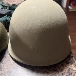 Steel Military Helmet With Camouflage Protectors On Top